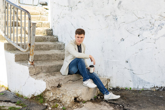 Young man in stylish clothes outdoors