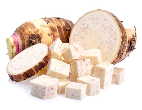 Fresh Taro Root and Diced Cubes Isolated on White Background