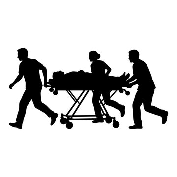 Medical team rushing patient on stretcher in emergency situation