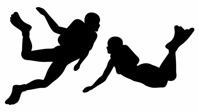 Silhouettes of two skydivers in freefall