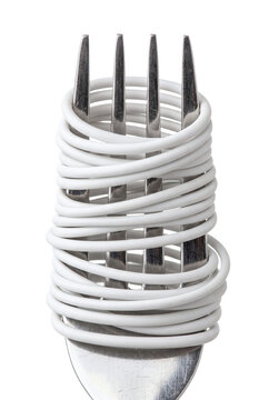 Fork wrapped with thick white electrical cable like spaghetti