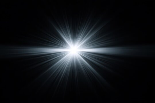 Bright, abstract light burst radiating outward in a dark setting.