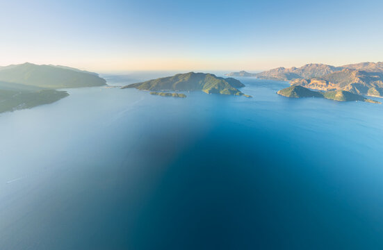 Marmaris, Turkey. Panoramic aerial view of empty bay without yachts, Cennet and Kechi Islands with Mediterranean Sea on horizon. Serene morning scene. Aerial view.