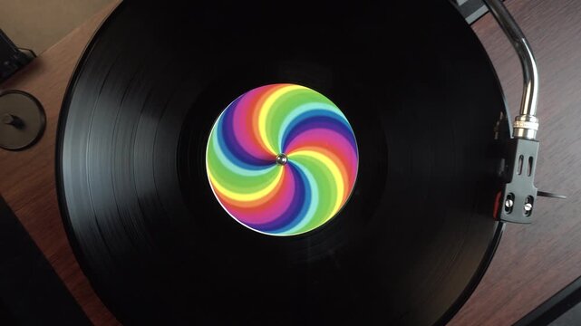 Starting Playback of Vinyl Record With Rainbow Sticker, Top Down View