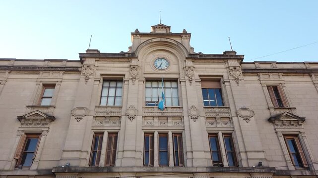 Once Railway Station Palace Facade with Clock and National Flag in Buenos Aires Argentina