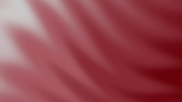 Minimalist blurred grey red gradient background with soft out of focus ambient lighting in seamless loop