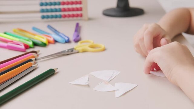 Little girl carefully cutting handmade card, sweet moment creativity preparing school, childhood, and love, Early Childhood Development, Hands-on Learning, fine motor skills, Back to School Readiness