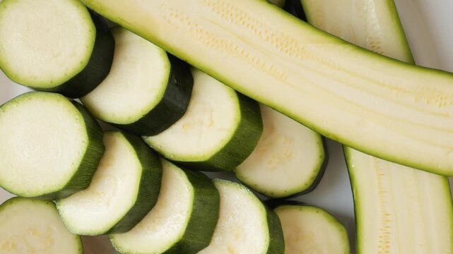 Fresh green zucchini sliced for cooking