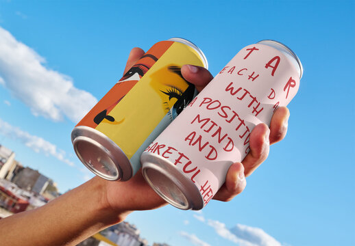 Mockup of Hand Holding two Tall Boy Can Skyward