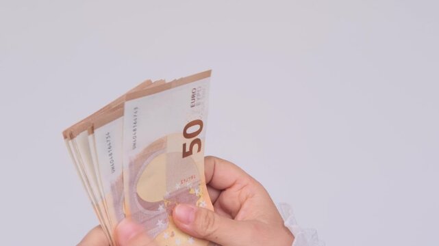 female hands hold money, count paper euro banknotes, Euro bills cash payments, savings, banking, save for vacation, exchange and cashing currency, monetary value, financial responsibility