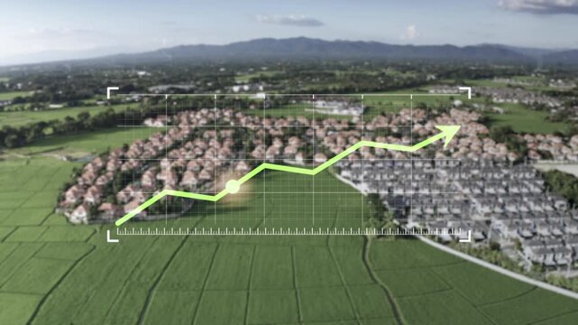 Drone footage showcases panoramic aerial view of expanding suburban residential development.  Motion graphic overlay illustrates positive economic growth trend with upward-trending market chart.