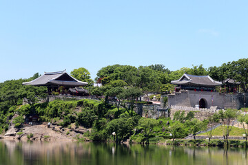 Fototapeta premium Historic Jinju Castle and Pavilion in South Korea, a Symbol of Korean Monarchy and Rich History by the Water