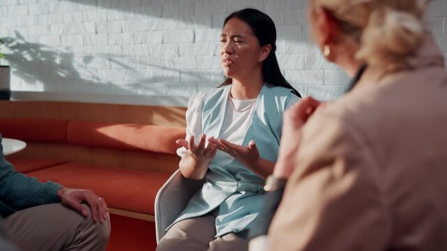 Support group, woman and talking in therapy, angry and counseling for trauma rehabilitation. Person with stress, psychology or share story in community center for mental health, anxiety or frustrated