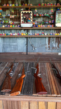 Vintage shooting gallery game at a traditional festival