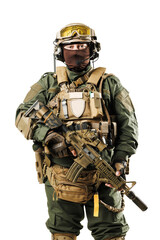Obraz premium Equipped military soldier in tactical gear holding firearm and standing ready for action