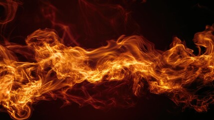 Fototapeta premium Wisps of vibrant orange and yellow flames dance against a dark background