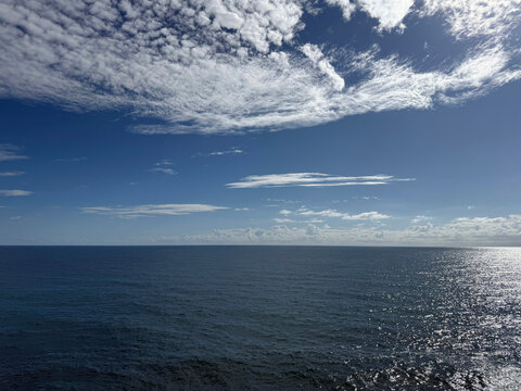 Sea blue glittering waves and beautiful sky.