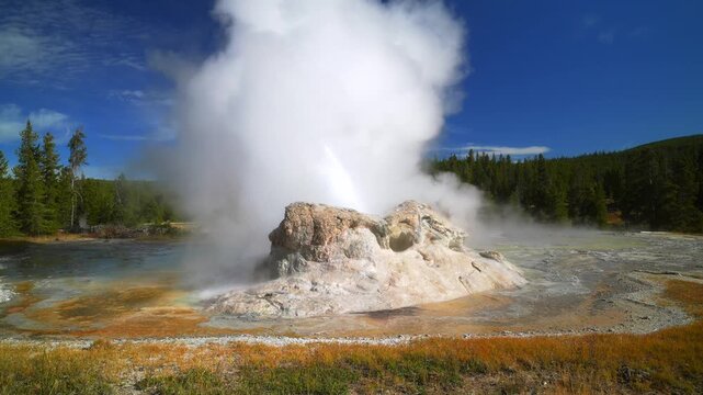 Castle Geyser Old Faithful Grand Geyser Midway Geyser Basin hot springs steam Fall Autumn morning blue sky sunny Yellowstone National Park Wyoming Gran Prismatic Spring geothermal nature landscape