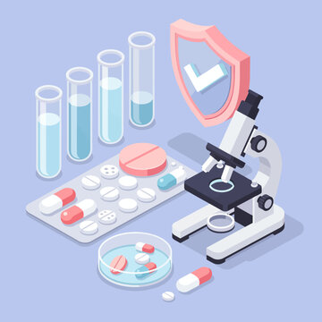Medical research concept with pills, microscope and test tubes on a surface