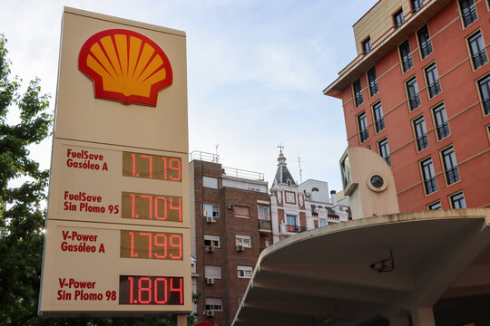 Prices of gasoline and diesel displayed on a signboard at a Shell petrol station in Madrid, Spain.