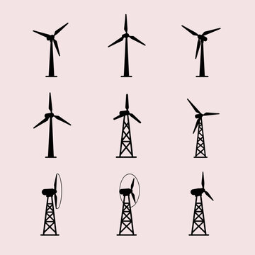 Several black silhouettes of wind turbines on a light pink background