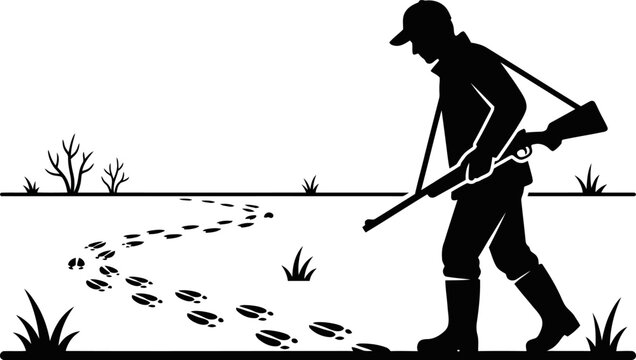 Man walking in field with shotgun following animal tracks