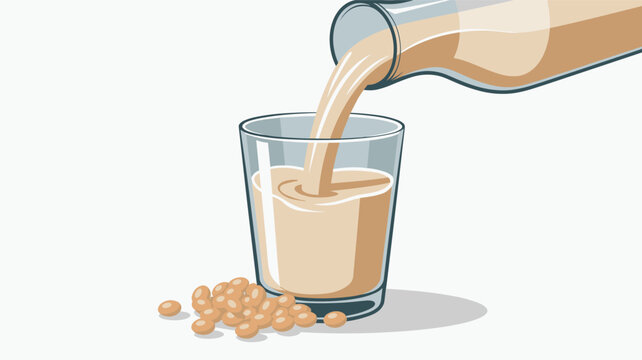 Fresh soy milk being poured from a glass bottle into a glass cup with a pile of soybeans on a clean white background.