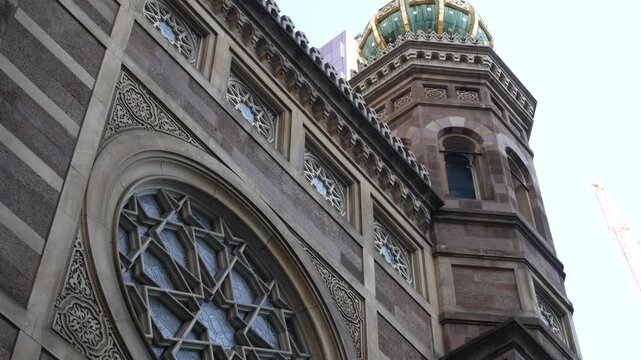 New York Central Synagogue old historic building 1872, Lexington avenue, United States of America. Jewish congregation in Manhattan. Judaism religion landmark. Star of David geometry ornament. Window