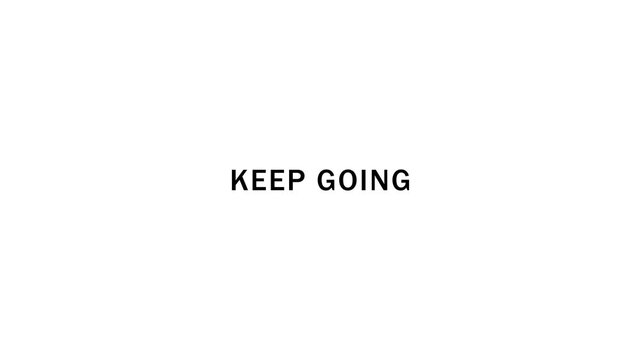 Stark black sans-serif lettering spelling out KEPGOING prominently displayed in the center of a vast, unblemished white canvas, offering a clear visual cue for persistence and forward momentum