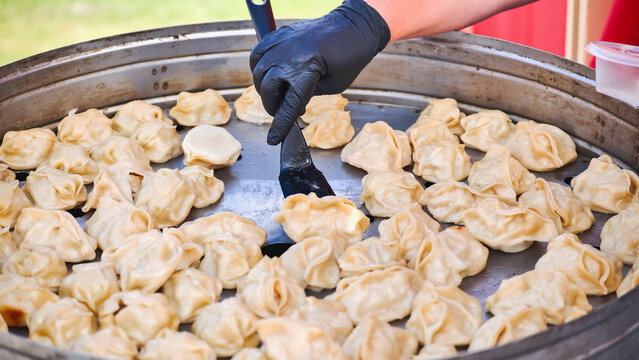 Serving momos at India Day street food festival in Moscow
