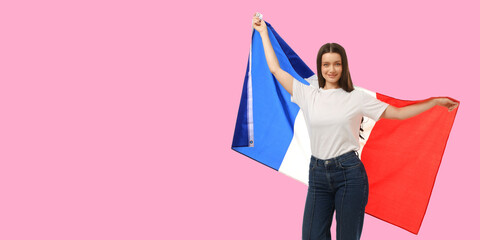 Obraz premium Woman waves French flag, expressing joy in vibrant space