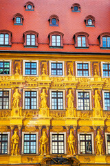 Fototapeta premium Beautiful yellow facade of the historic house of the seven electors located at the market square in wroclaw poland architecture background