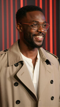 Man in Trench Coat with LED Background