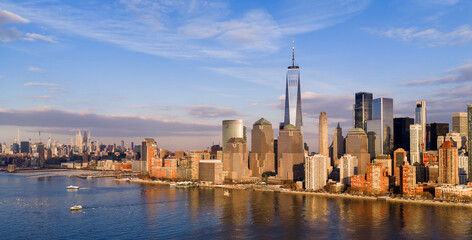 Obraz premium Manhattan waterfront panorama with modern skyscrapers in New York City, NYC. New York skyline panorama. Manhattan skyline daytime panorama in New York City. New York City skyline.