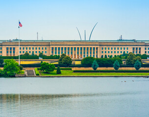 Naklejka premium Pentagon building exterior in Arlington. Pentagon military headquarters in Washington DC. Pentagon government architecture with security. Pentagon federal building in United States.