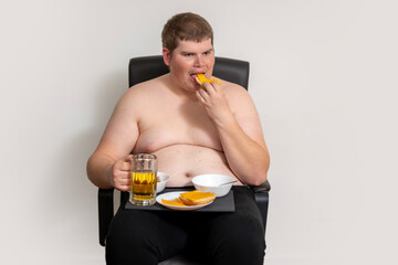 Fototapeta premium Obesity problem shows unhealthy lifestyle. Overweight man faces obesity risk. Poor diet causes obesity gain. Obesity concept with sedentary habits.