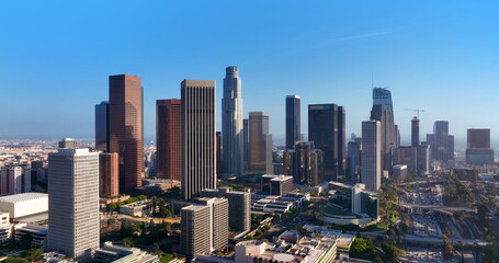 Naklejka premium LA city view from drone. Los Angeles architecture in California. Los Angeles business district buildings. Los Angeles skyline on West Coast. Los Angeles urban traffic view.