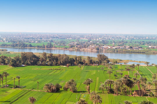 View from above of the Nile river, in Middle Egypt, region of El-Minia. On each bank of the sacred river, every square meter is used for agriculture.