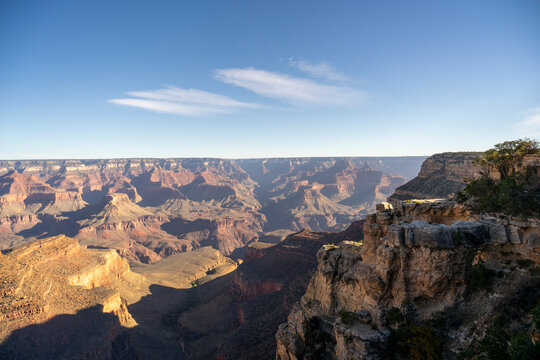 Morning sun casts shadows across the Grand Canyon