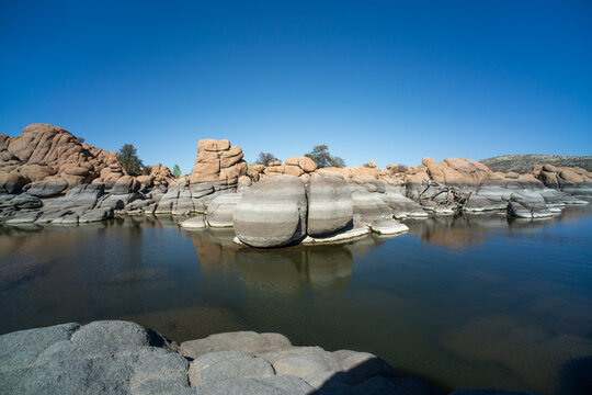 Smooth rock formations on the shore of Watson Lake