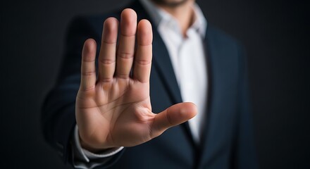 Obraz premium Hand Making Stop Gesture, Rejection and Boundary Concept in Business Suit