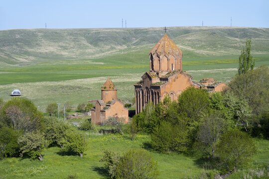 Historic church in the middle of a green landscape with hills and clear skies, Marmashen Monastery, Marmashen Vank, Shirak Province, Armenia