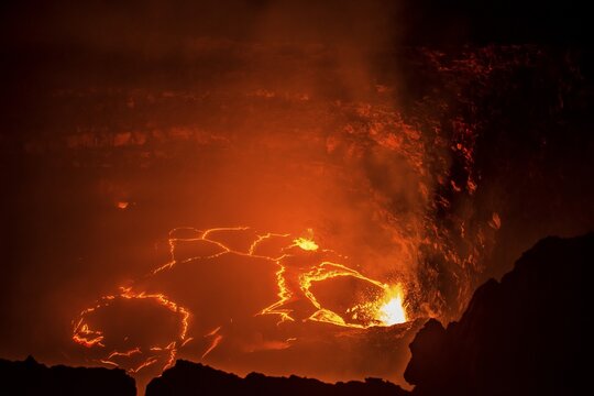 Glowing active lava lake, Erta Ale shield volcano, Danakil depression, Afar region, Ethiopia