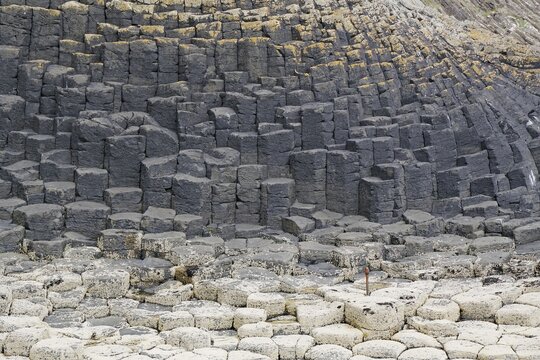 Close-up view of hexagonal basalt columns and rocks on the coast, Hebridean Overture, Isle of Staffa, Inner Hebrides, Scotland, United Kingdom