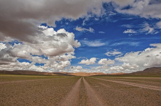 Low hanging clouds along the road from Ali and Gerze, Western Tibet, Asia