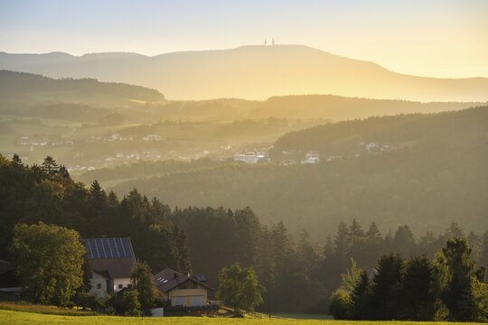View from the Rossberg to the Hohenbogen (High Arch), landscape with forest, meadows and mountains around the town of Bad K&ouml;tzting. In the morning at sunrise. District of Cham, Upper Palatinate, Bavarian Forest, Bavaria, Germany
