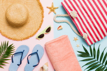 Composition with stylish beach accessories on colored background, top view. Beach fashion flat lay,...