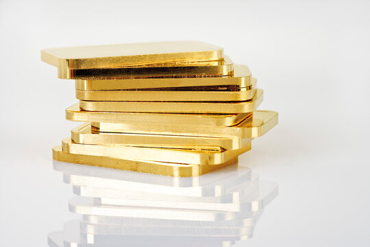 Gold bars on white background