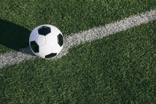 Football on the line on football ground