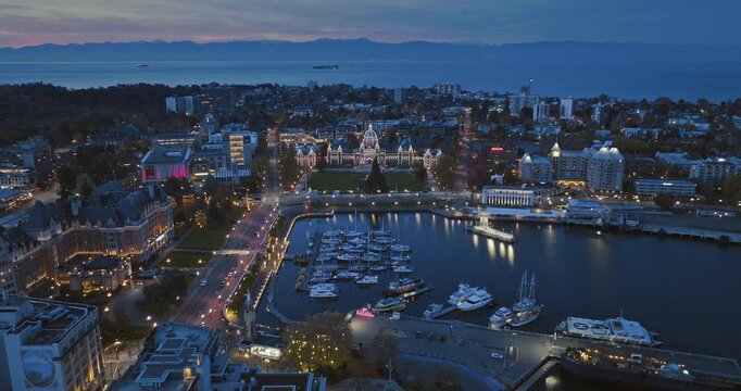 Aerial view of BC Legislative Parliament Building near harbor at night in Victoria, British Columbia, Canada	
